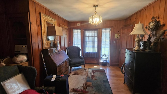 455 Laurel Pine Rd, Cresco, PA 18326 - living area with wooden walls, a chandelier, and light wood-style flooring