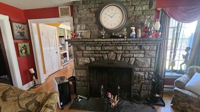 455 Laurel Pine Rd, Cresco, PA 18326 - detailed view of a stone fireplace, wood finished floors, and baseboards
