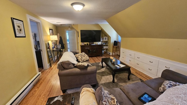 455 Laurel Pine Rd, Cresco, PA 18326 - living room with baseboard heating, light wood finished floors, and lofted ceiling