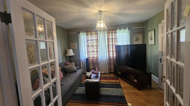 455 Laurel Pine Rd, Cresco, PA 18326 - living area featuring wood finished floors and a chandelier