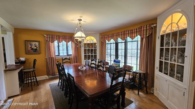 455 Laurel Pine Rd, Cresco, PA 18326 - dining room with hardwood / wood-style flooring and a chandelier