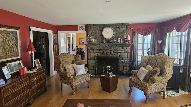 455 Laurel Pine Rd, Cresco, PA 18326 - living room featuring wood-type flooring and a stone fireplace