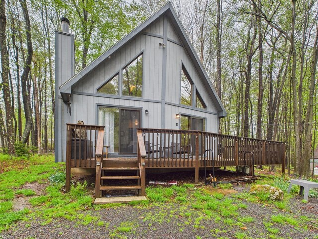 199 Wyomissing Dr, Pocono Lake, PA 18347 - back of house with a chimney and a wooden deck