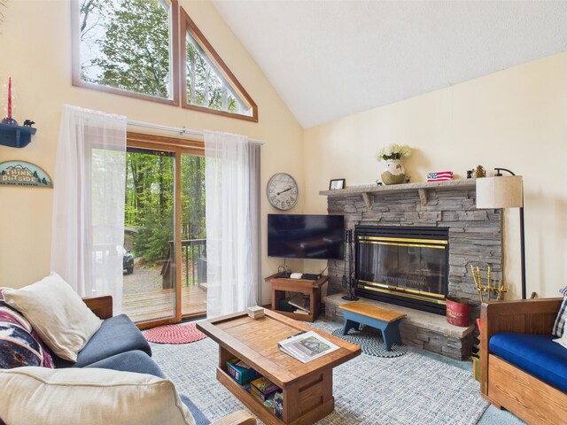 199 Wyomissing Dr, Pocono Lake, PA 18347 - living room featuring high vaulted ceiling and a fireplace