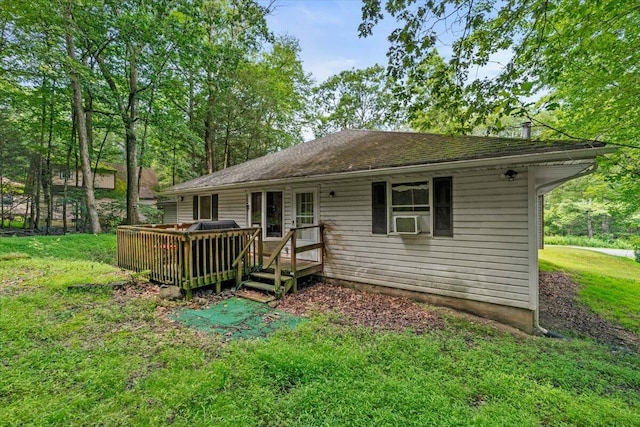 2726 Pocono Cir, Bartonsville, PA 18321 - rear view of property with a yard, a wooden deck, and cooling unit