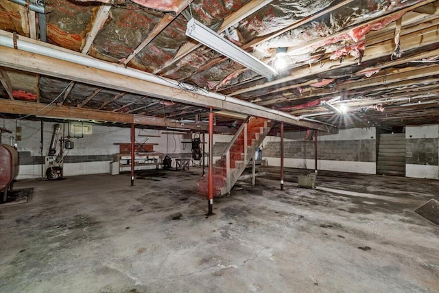 2726 Pocono Cir, Bartonsville, PA 18321 - unfinished below grade area featuring stairs and a heating unit