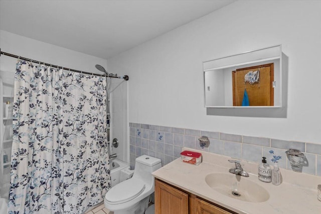 2726 Pocono Cir, Bartonsville, PA 18321 - bathroom with vanity, tile walls, shower / tub combo with curtain, a wainscoted wall, and tile patterned floors