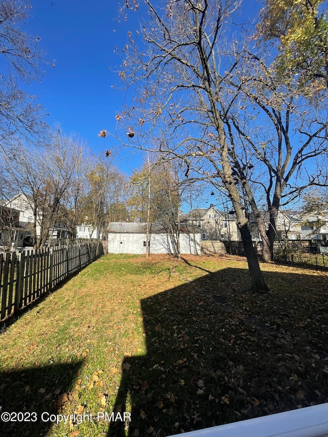 view of yard with a fenced backyard