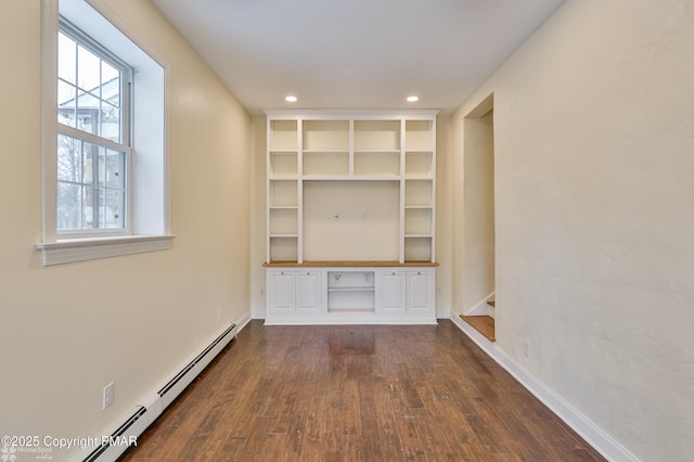 interior space with recessed lighting, a baseboard radiator, baseboards, and dark wood-style floors