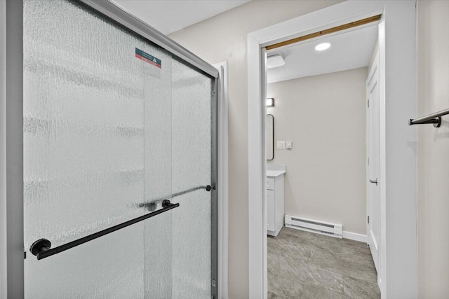 173 Water View Dr, Hawley, PA 18428 - full bath featuring a baseboard radiator, vanity, and a stall shower