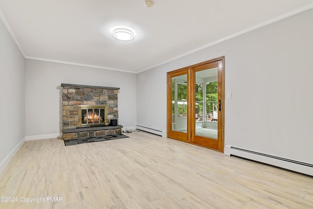 living room featuring a baseboard radiator, wood finished floors, crown molding, a stone fireplace, and a baseboard heating unit