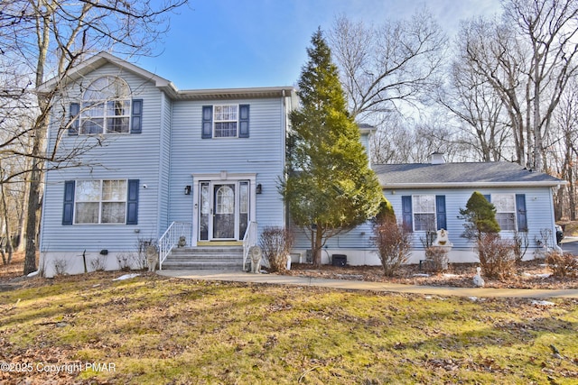 view of front of home featuring a front lawn