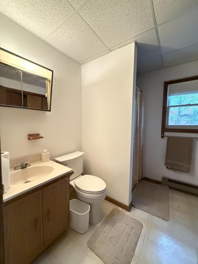 281 Fern Ridge Rd, Blakeslee, PA 18610 - full bath featuring baseboard heating, a drop ceiling, tile patterned floors, vanity, and curtained shower