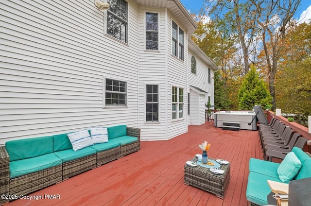 deck with an outdoor hangout area