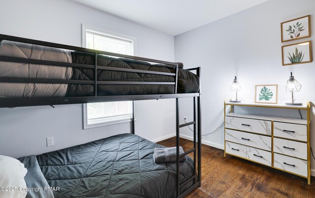 bedroom featuring dark hardwood / wood-style floors