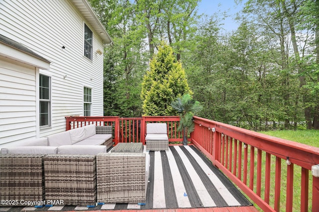 deck featuring outdoor lounge area