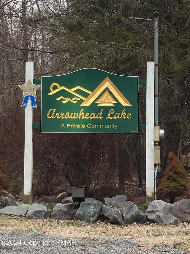 view of community sign