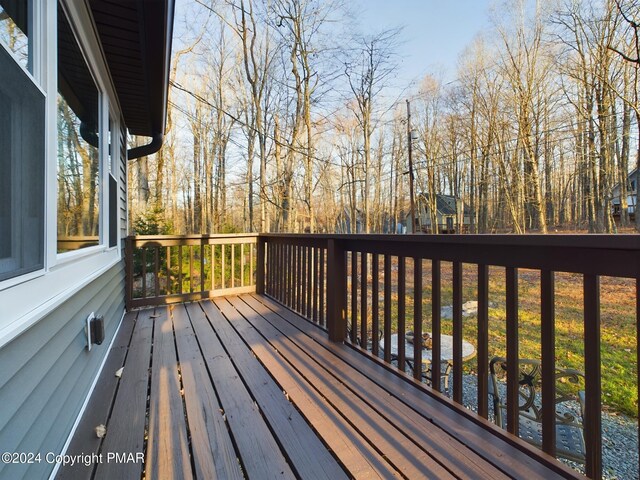 rear view of property with a deck