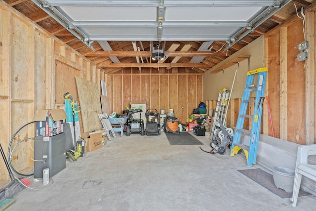 209 Greenbriar Cir, Tobyhanna, PA 18466 - garage featuring a garage door opener