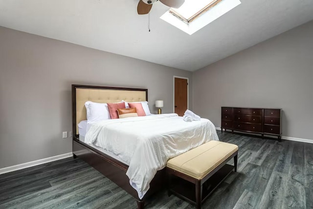 bedroom with vaulted ceiling, wood finished floors, baseboards, and ceiling fan