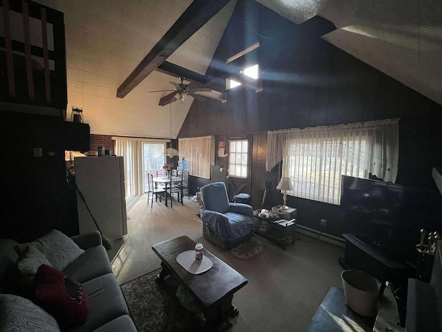 living room with beam ceiling, high vaulted ceiling, and a ceiling fan