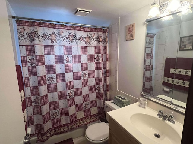 full bathroom with vanity, toilet, and a shower with curtain