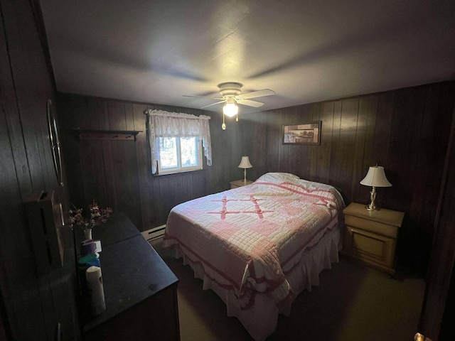 bedroom with a baseboard radiator and a ceiling fan