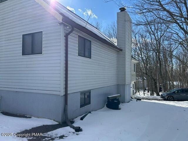 view of snow covered property