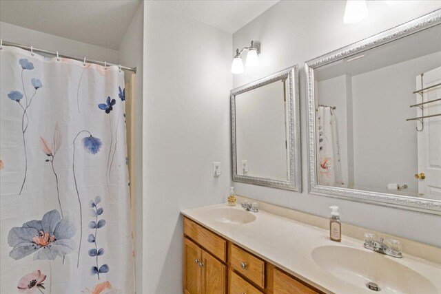 250 Grouse Run, Cresco, PA 18326 - full bathroom featuring double vanity and a shower with shower curtain