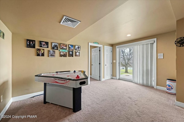 rec room featuring carpet floors, baseboards, and visible vents