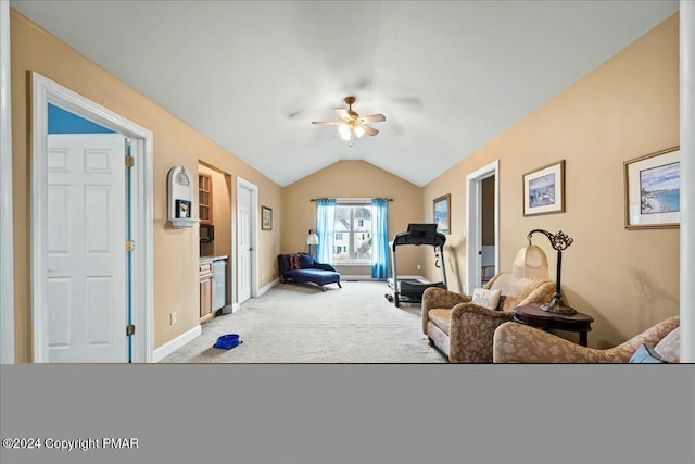 exercise room with lofted ceiling, carpet, baseboards, and a ceiling fan