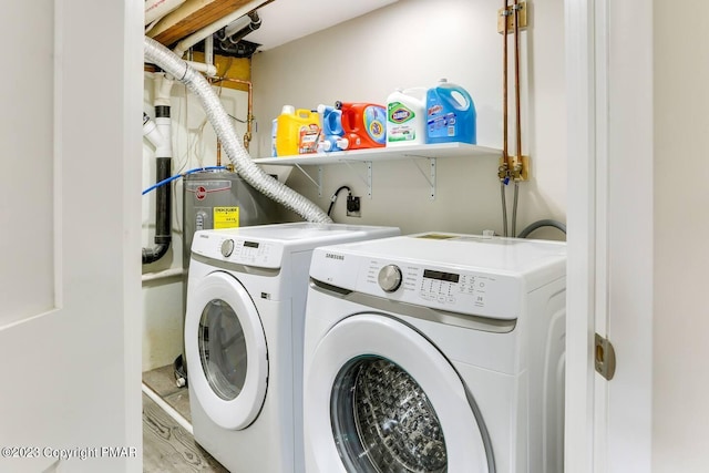 laundry room featuring laundry area and washing machine and clothes dryer