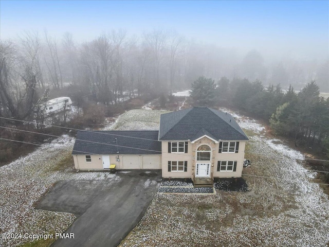 view of front of house featuring driveway and an attached garage