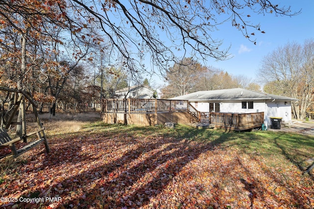 view of yard with a wooden deck