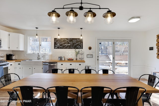 dining room featuring sink