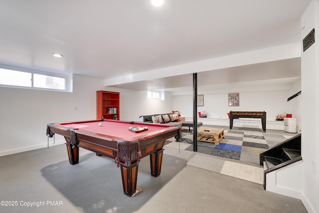 game room with pool table and concrete flooring