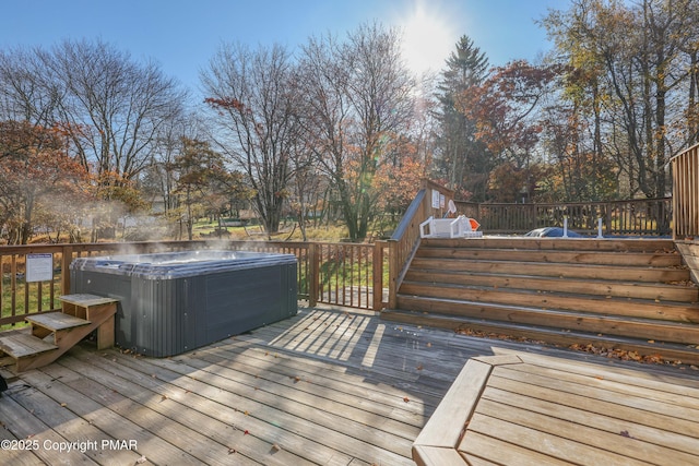 deck featuring a hot tub