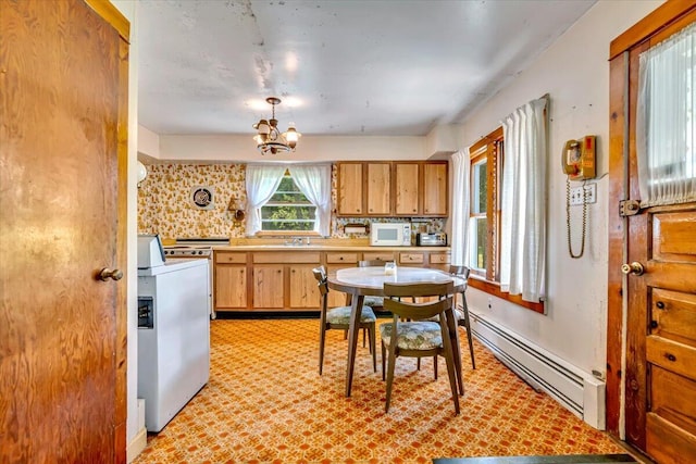 207 Scenic Dr, Kunkletown, PA 18058 - kitchen featuring a baseboard radiator, white appliances, light countertops, and a chandelier