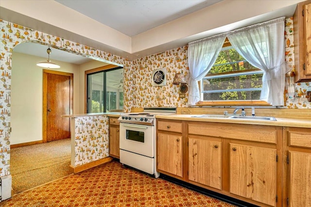 207 Scenic Dr, Kunkletown, PA 18058 - kitchen featuring electric stove, plenty of natural light, light countertops, and wallpapered walls