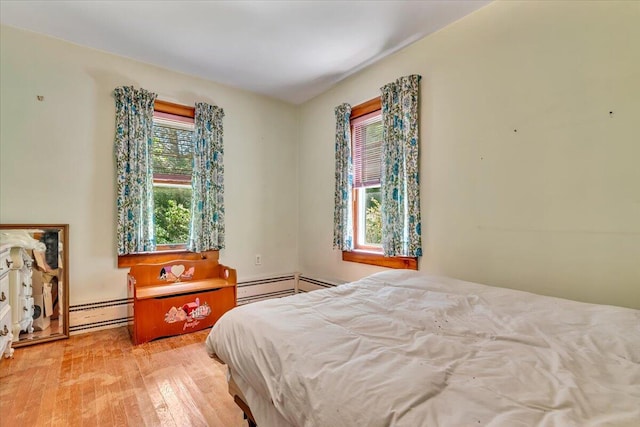 207 Scenic Dr, Kunkletown, PA 18058 - bedroom featuring a baseboard heating unit and wood finished floors