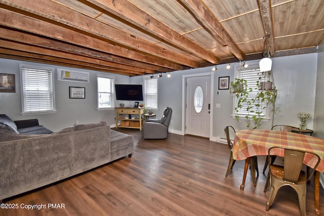 living area featuring dark wood-style flooring, beam ceiling, a baseboard radiator, wood ceiling, and an AC wall unit