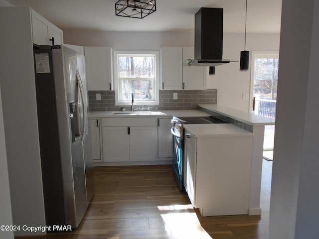 kitchen with ventilation hood, a sink, stainless steel fridge, electric stove, and light wood-type flooring