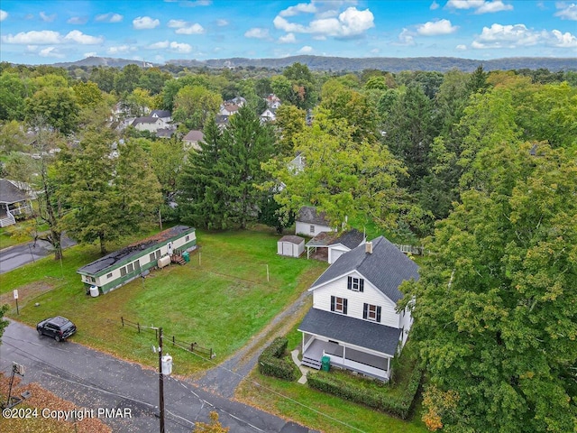 aerial view featuring a view of trees