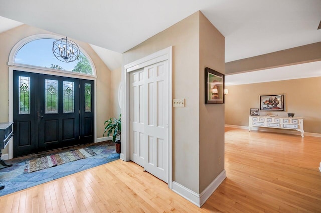 938 Meadow Cir, Bethlehem, PA 18017 - entrance foyer with hardwood / wood-style floors, a chandelier, and lofted ceiling