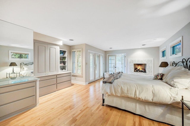 938 Meadow Cir, Bethlehem, PA 18017 - bedroom with light wood finished floors and a premium fireplace
