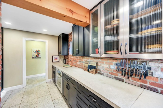 938 Meadow Cir, Bethlehem, PA 18017 - kitchen with dark speckled floor, light countertops, glass insert cabinets, tasteful backsplash, and recessed lighting
