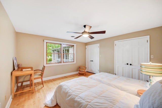 938 Meadow Cir, Bethlehem, PA 18017 - bedroom featuring wood finished floors, ceiling fan, and two closets