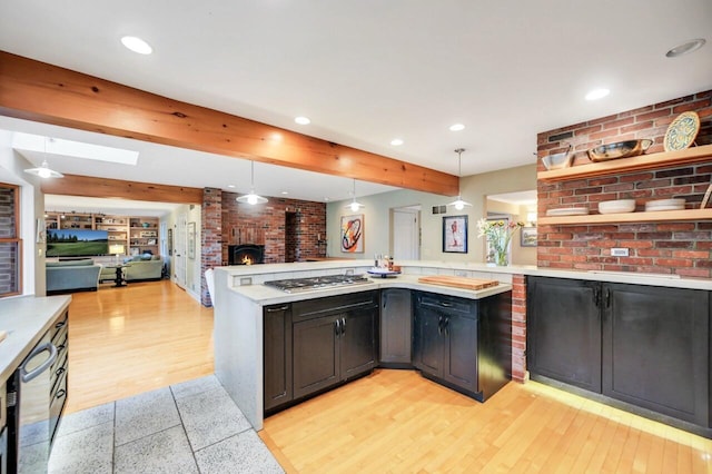 938 Meadow Cir, Bethlehem, PA 18017 - kitchen with stainless steel appliances, open floor plan, light countertops, beam ceiling, and pendant lighting