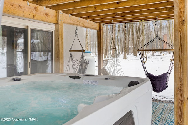 interior space with a hot tub