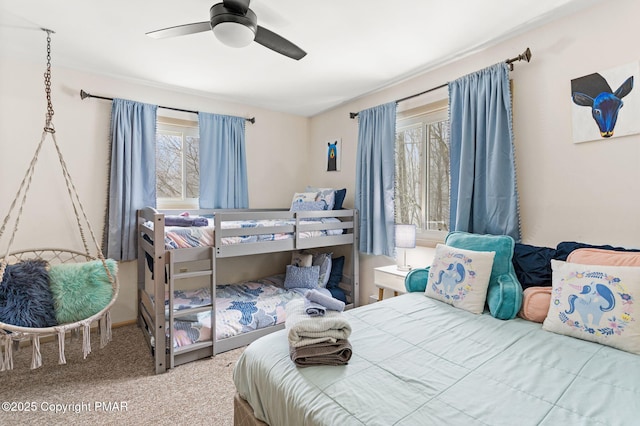 bedroom featuring ceiling fan and carpet floors